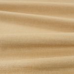Tessuto Linara di Romo nella colorazione Fudge drappeggiato, per mostrarne la caduta e la finitura spazzolata.