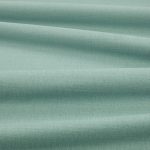 Tessuto Linara di Romo nella colorazione Azure drappeggiato, per mostrarne la caduta e la finitura spazzolata.