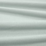 Tessuto Linara di Romo nella colorazione French Blue drappeggiato, per mostrarne la caduta e la finitura spazzolata.