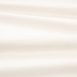 Tessuto Linara di Romo nella colorazione Antique White drappeggiato, per mostrarne la caduta e la finitura spazzolata.