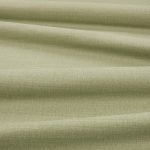 Tessuto Linara di Romo nella colorazione Artichoke drappeggiato, per mostrarne la caduta e la finitura spazzolata.