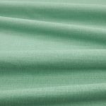 Tessuto Linara di Romo nella colorazione Verdigris drappeggiato, per mostrarne la caduta e la finitura spazzolata.