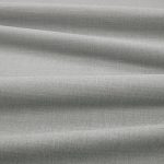 Tessuto Linara di Romo nella colorazione Eucalyptus drappeggiato, per mostrarne la caduta e la finitura spazzolata.