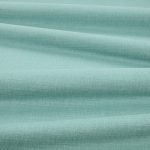 Tessuto Linara di Romo nella colorazione Agate drappeggiato, per mostrarne la caduta e la finitura spazzolata.