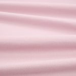 Tessuto Linara di Romo nella colorazione Vintage Rose drappeggiato, per mostrarne la caduta e la finitura spazzolata.