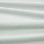 Tessuto Linara di Romo nella colorazione Lovat drappeggiato, per mostrarne la caduta e la finitura spazzolata.