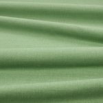 Tessuto Linara di Romo nella colorazione Tendril drappeggiato, per mostrarne la caduta e la finitura spazzolata.