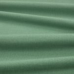 Tessuto Linara di Romo nella colorazione Shamrock drappeggiato, per mostrarne la caduta e la finitura spazzolata.