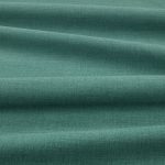 Tessuto Linara di Romo nella colorazione Spruce drappeggiato, per mostrarne la caduta e la finitura spazzolata.