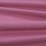 Tessuto Linara di Romo nella colorazione Rosella drappeggiato, per mostrarne la caduta e la finitura spazzolata.
