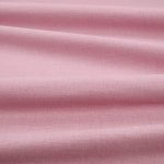 Tessuto Linara di Romo nella colorazione Melrose drappeggiato, per mostrarne la caduta e la finitura spazzolata.
