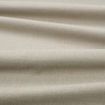 Tessuto Linara di Romo nella colorazione Camouflage drappeggiato, per mostrarne la caduta e la finitura spazzolata.