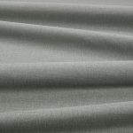 Tessuto Linara di Romo nella colorazione Tweed drappeggiato, per mostrarne la caduta e la finitura spazzolata.