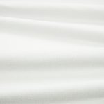 Tessuto Linara di Romo nella colorazione Seapearl drappeggiato, per mostrarne la caduta e la finitura spazzolata.