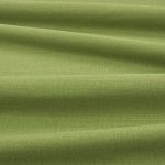 Tessuto Linara di Romo nella colorazione Matcha drappeggiato, per mostrarne la caduta e la finitura spazzolata.