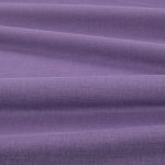 Tessuto Linara di Romo nella colorazione Anemone drappeggiato, per mostrarne la caduta e la finitura spazzolata.