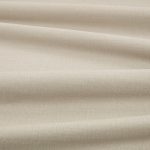 Tessuto Linara di Romo nella colorazione Heron drappeggiato, per mostrarne la caduta e la finitura spazzolata.
