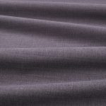 Tessuto Linara di Romo nella colorazione Graphite drappeggiato, per mostrarne la caduta e la finitura spazzolata.