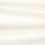 Tessuto Linara di Romo nella colorazione Porcelain drappeggiato, per mostrarne la caduta e la finitura spazzolata.