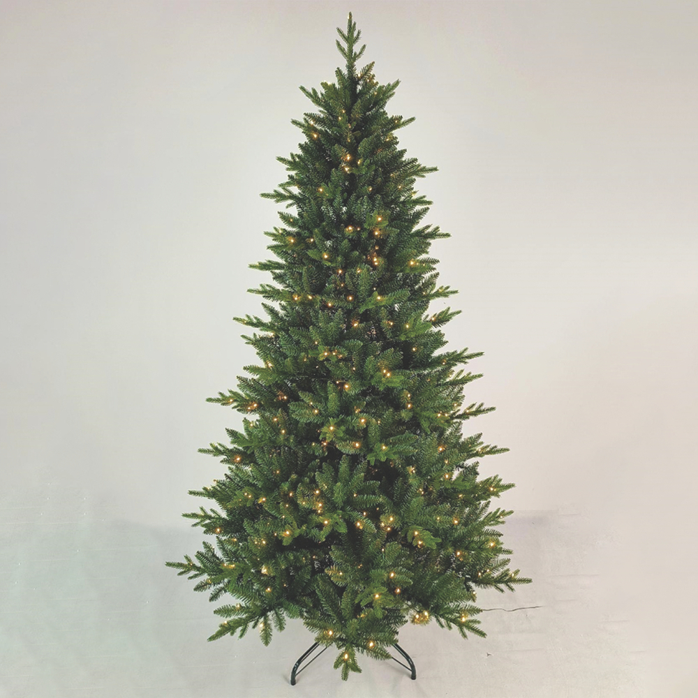 Albero di Natale preilluminato Valia Calda alto 225 cm con luci LED accese a luc Albero di Natale preilluminato Valia Calda alto 225 cm con luci LED accese a luce calda, su supporto a croce in metallo