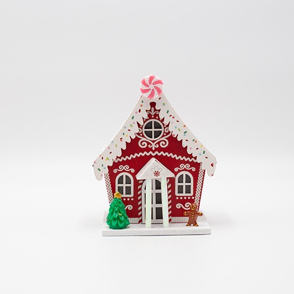 Casetta di Natale luminosa in carta rossa con biscotto di pan di zenzero, fotografia del produttore: gli altri oggetti eventualmente presenti nella scena non sono compresi