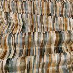 Tessuto Benito di Romo, collezione Zephi, colorazione Tamarind 7803/09
