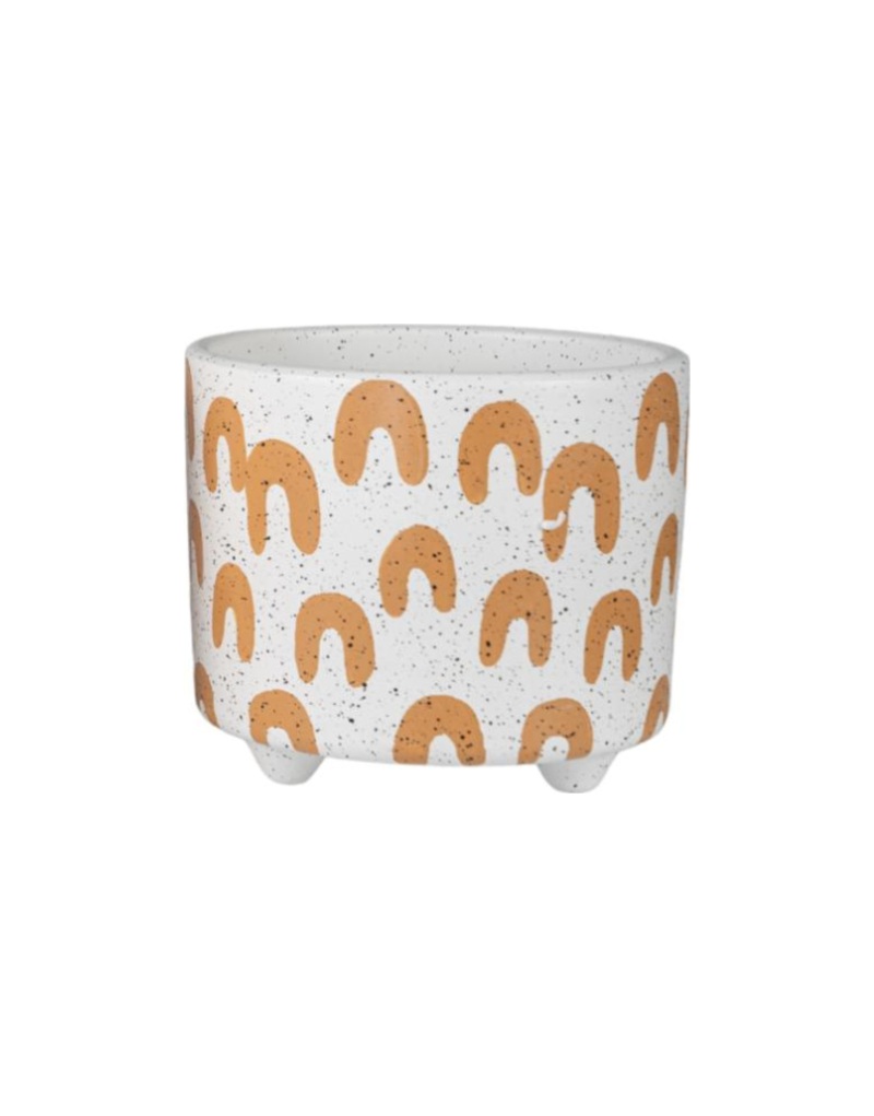 Cachepot in ceramica bianca punteggiata con archetti color terracotta, su tre piedini