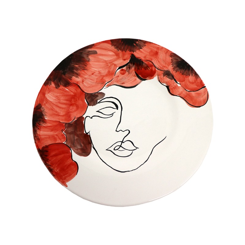 Piatto di presentazione Tratto Papavero Virginia Casa Piatto di presentazione Tratto di Virginia Casa in ceramica bianca Ø 35 cm, decorato a mano con un volto a tratto nero e una chioma di papaveri rossi, su fondo bianco