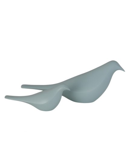 Le due colombe in ceramica verde acqua fotografate da un’altra angolazione su fondo bianco