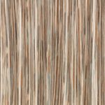 Il velo Rafi di Villa Nova nella colorazione Sienna drappeggiato in pieghe morbide: righe verticali terra di Siena, tabacco e grigio salvia su fondo écru, righe tessute e sovrastampate con velature di colore.