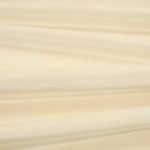 Il velluto Barcelona di Villa Nova nella colorazione Alabaster in pieghe morbide, che mostrano la lucentezza del pelo.